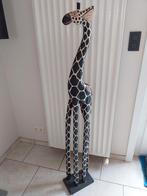 Statute en bois girafe., Enlèvement