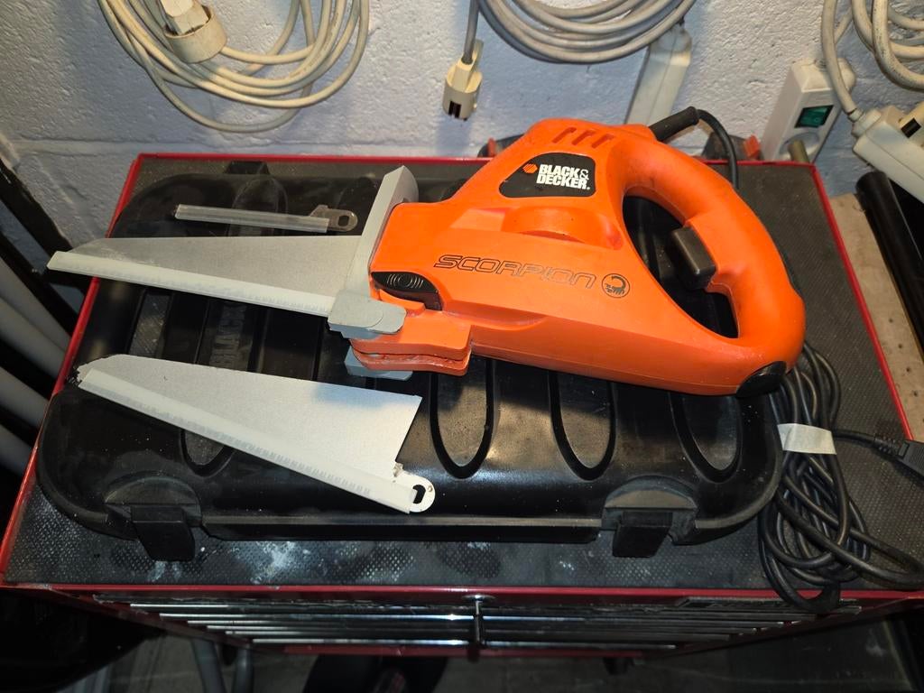 Elektrische handzaag, Ophalen