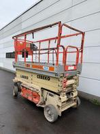 JLG schaarlift 3246ES in prima staat 12 meter werkhoogte, Ophalen