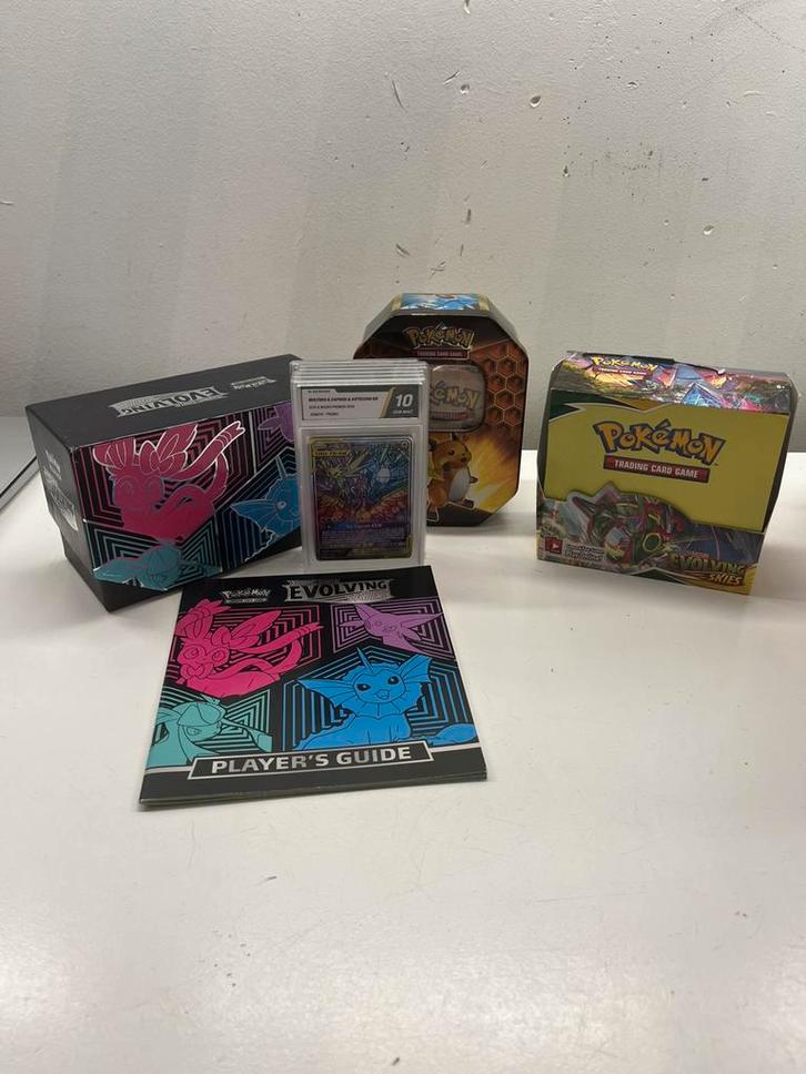 Pokemon collectie Evolving Skies, oude kaarten, (on)gegrade, Hobby en Vrije tijd, Verzamelkaartspellen | Pokémon, Zo goed als nieuw