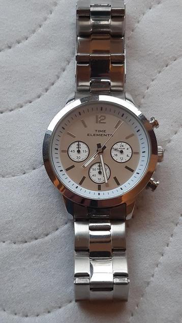 Horloge, Time Elements, Quartz  beschikbaar voor biedingen