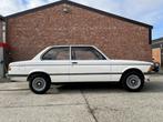 Bmw 315i E21 coupé "1ste eigenaar" Alpine-white/oh-boek/1983, Auto's, BMW, Zwart, 4 cilinders, Wit, Bedrijf