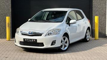Toyota Auris 1.8 Hybride | Navigatie | Airco | Garantie, Auto's, Toyota, Euro 5, Zwart, Wit, 5 deurs