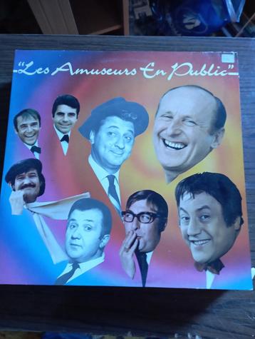 lot de vinyles (33t) coluche fernand raynaud etc ... disponible aux enchères