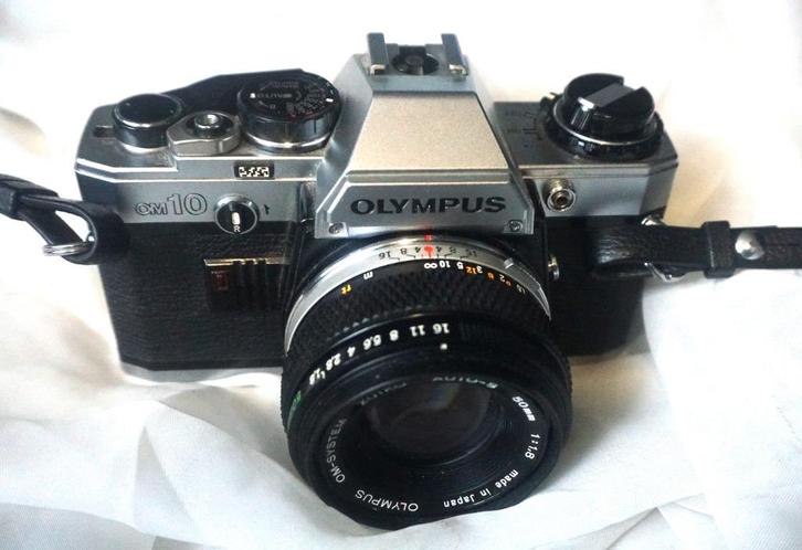 Olympus OM 10 + Olympus 50mm 18: bijna nieuw, Audio, Tv en Foto, Fotocamera's Analoog, Zo goed als nieuw, Spiegelreflex, Olympus