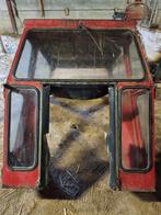 Cabine tractor bril, Ophalen