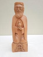 Houtsculptuur, Ophalen