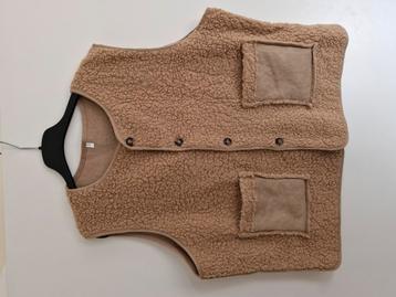 Warme bodywarmer beige dames beschikbaar voor biedingen