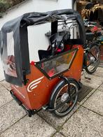 Vélo cargo bi moteur, peut transporter jusqu’à 4 enfants., Comme neuf