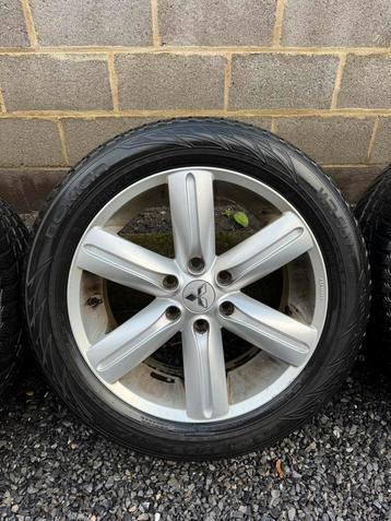 Mitsubishi-velgen met winterbanden 265 50 20 beschikbaar voor biedingen