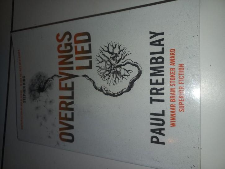 Paul Tremblay - Overlevingslied, Boeken, Thrillers, Zo goed als nieuw, Ophalen of Verzenden