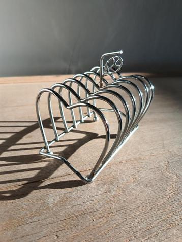 Metalen toasthouder met appel  beschikbaar voor biedingen