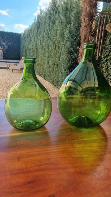 2  brocante gistflessen Dame Jeanne beschikbaar voor biedingen
