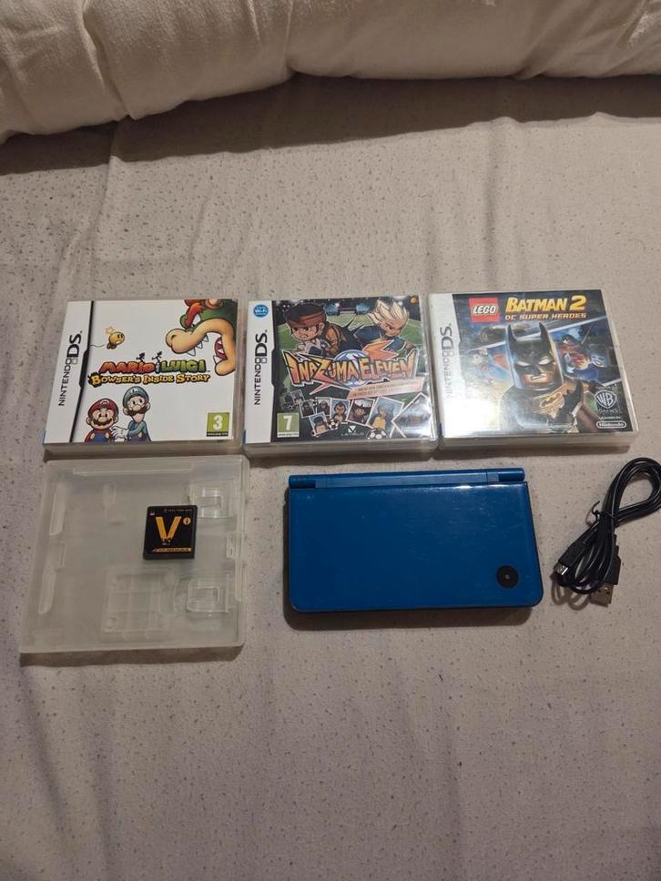 DSi XL + games apart, Games en Spelcomputers, Spelcomputers | Nintendo DS, Zo goed als nieuw, Dsi, Blauw, Ophalen of Verzenden