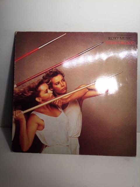 LP - Roxy Music - Flesh + Blood ( Vinyl ), Cd's en Dvd's, Vinyl | Rock, Zo goed als nieuw, Poprock, 12 inch, Ophalen of Verzenden