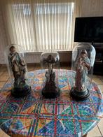 Heilige beelden met stolp, Ophalen