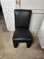 Zwarte fauteuil