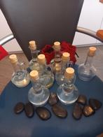 Flessen voor massageolie en hotstones, Ophalen
