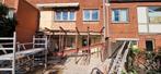 Muur afbreken en poutrel plaatsen.0465784727