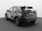 Toyota Yaris Cross 1.5 VVT-ie Hybrid 85kW Dynamic Plus CVT, Auto's, Stof, Gebruikt, 750 kg, Overige kleuren