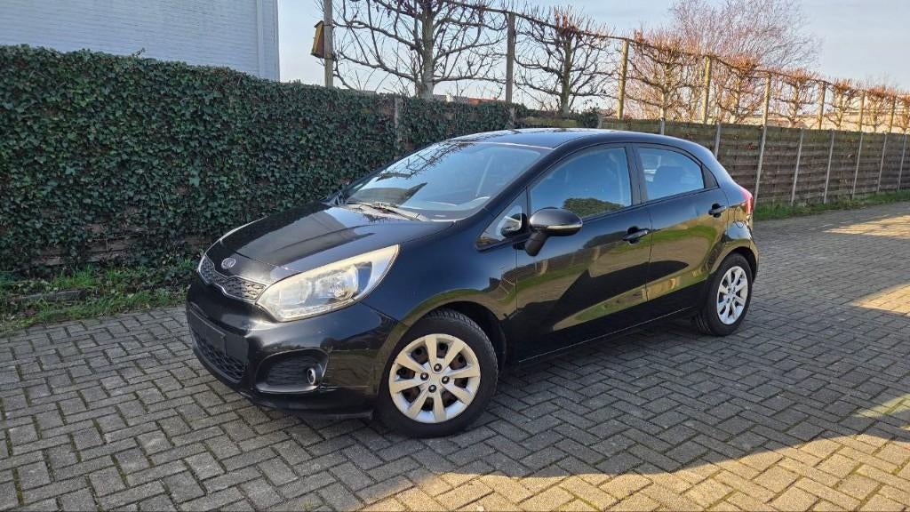Kia Rio 1.2D van 2012, met 220.000kms, Auto's, Kia, Euro 5, Zwart, Bedrijf, Rio