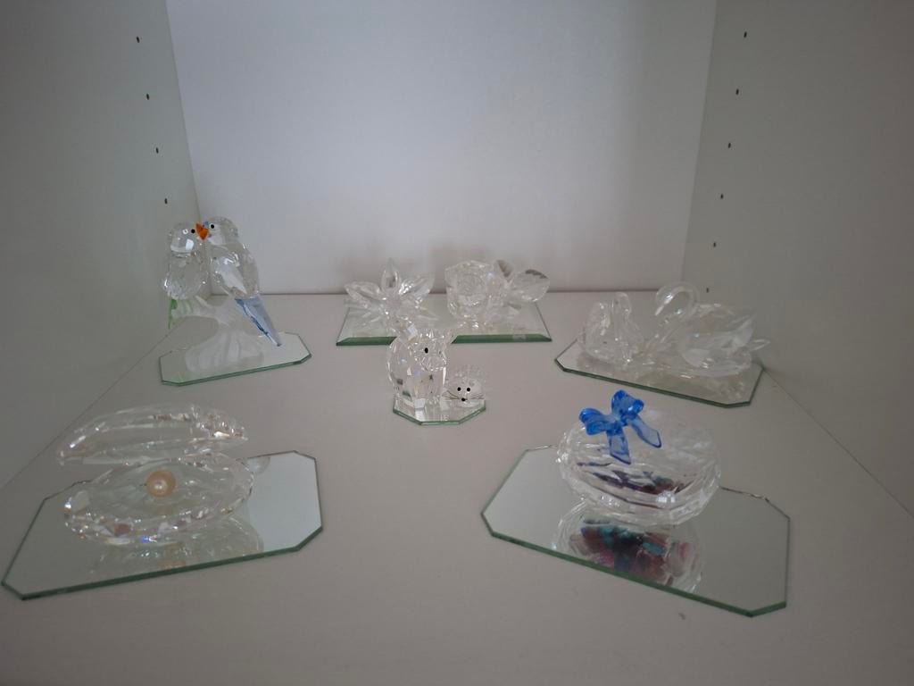 Swarovski beeldjes, Ophalen