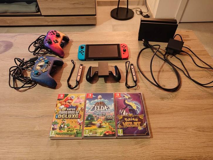 Nintendo Switch V2 (betere batterij) + 5 games + docking sta, Games en Spelcomputers, Spelcomputers | Nintendo Switch, Zo goed als nieuw