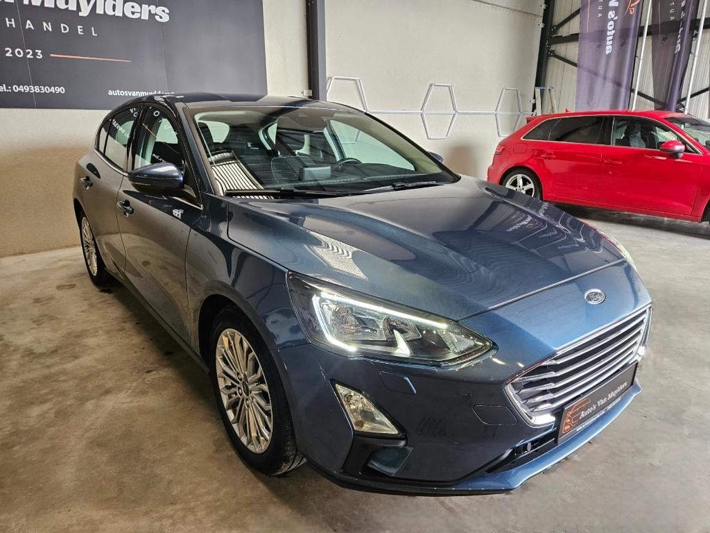 Ford Focus Titanium benzine 12 maanden garantie 52000KM, Auto's, Euro 6, Blauw, Bedrijf, 999 cc