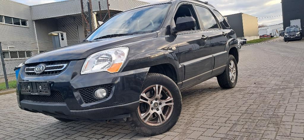 KIA SPORTAGE.2000cc DIESEL/GEKEURD/12MAAND GARANTIE, Auto's, Kia, Monovolume, Zwart, Zwart, Bedrijf