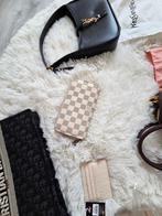 Louis Vuiton portemonnee, Ophalen