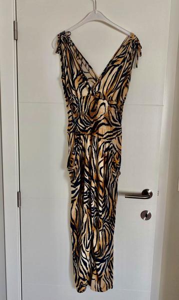 Leuke jumpsuit met dierenprint beschikbaar voor biedingen