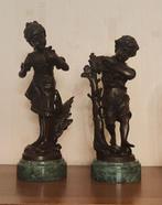Twee bronzen beeldjes (meisje en jongen met vogels), Ophalen, Brons