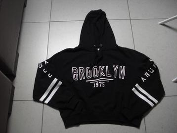 Divided zwarte sweater met kap, meisjes/dames. mt M beschikbaar voor biedingen