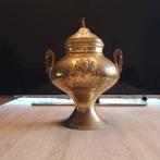 Koperen urne, Ophalen