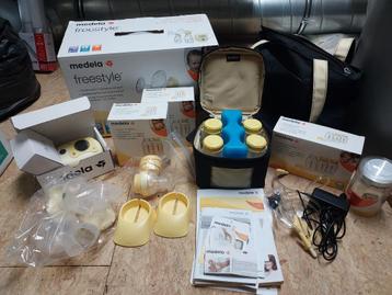 Medela freestyle dubbele elektrische kolf + veel accessoires beschikbaar voor biedingen