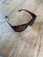 Polaroid zonnebril, Ophalen of Verzenden, Zo goed als nieuw, Zonnebril