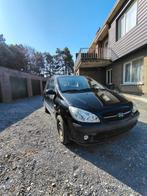 Hyundai Getz benzine euro 4 lez ok, Auto's, Voorwielaandrijving, Stof, Zwart, Grijs