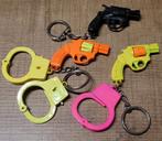 3 sleutelhangers: revolvers en handboeien, Enlèvement ou Envoi, Utilisé, Autres types