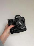 Nikon f100 met batterygrip en 50mm 1.4, Comme neuf, Enlèvement, Nikon