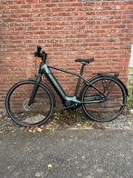 NIEUWE BTWIN ELEKTRISCHE FIETS MET MIDDENMOTOR, Ophalen