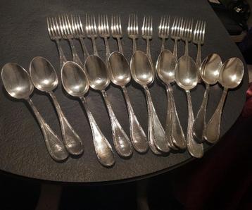 Verzilverde lepels en vorken beschikbaar voor biedingen