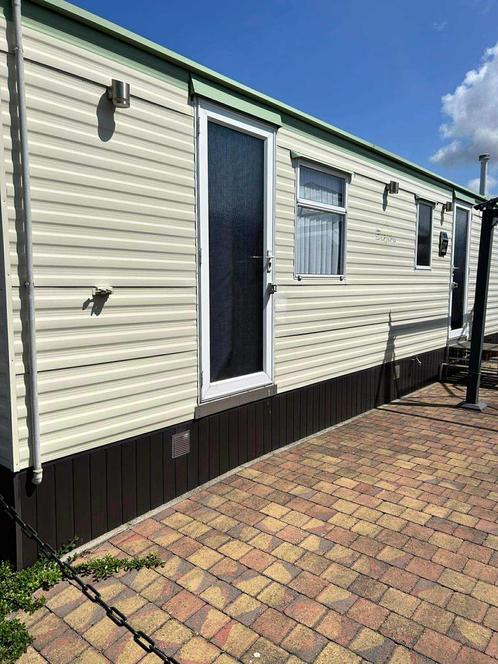 Zeer mooie gerenoveerde stacaravan in knokke heist, Caravans en Kamperen, Caravans, Particulier, tot en met 2, Douche, Ophalen