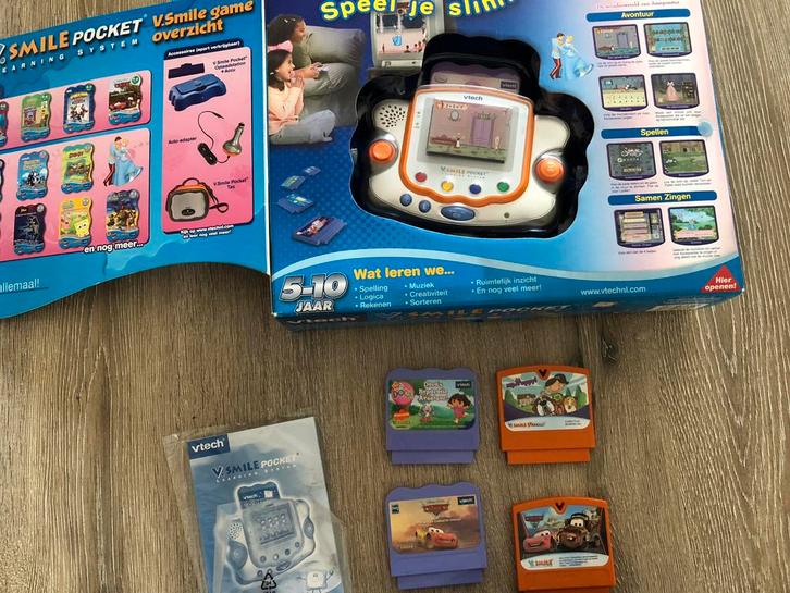 Vtech smile pocket met 5games en kabel voor in auto en op tv, Kinderen en Baby's, Speelgoed | Vtech, Zo goed als nieuw, 6 jaar of ouder