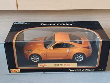nissan 350 Z model auto schaal 1/18 orange kleur beschikbaar voor biedingen