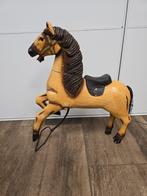 Houten paard, Ophalen