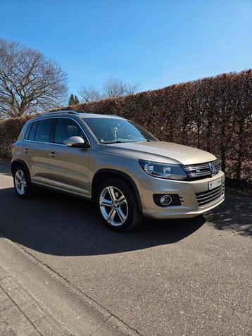 Volkswagen Tiguan R-LINE 1.4 TSI AUTOMAAT, Auto's, Volkswagen, 110 kW, Overige kleuren, Leder, Bruin