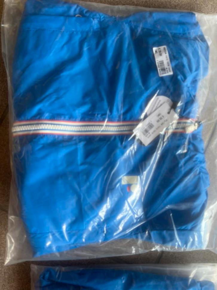 Regenjasje 128 en 140 nieuw!, Kinderen en Baby's, Kinderkleding | Maat 128, Zo goed als nieuw, Ophalen