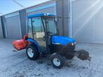 New Holland TC 21D Hydro minitractor cabine met klepelmaaier, Ophalen, Gebruikt, Tot 2500, Tot 80 Pk