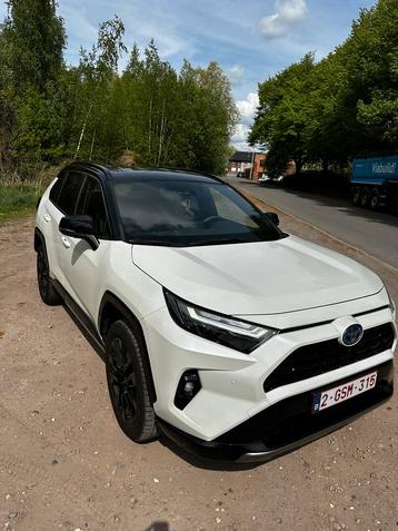 Toyota RAV4 Style Plus 2WD 2.5 hybride, Auto's, Toyota, Euro 6, Leder en Stof, Wit, 5 deurs