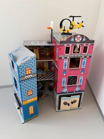 Houten brandweer- en politiekazerne van KidKraft beschikbaar voor biedingen